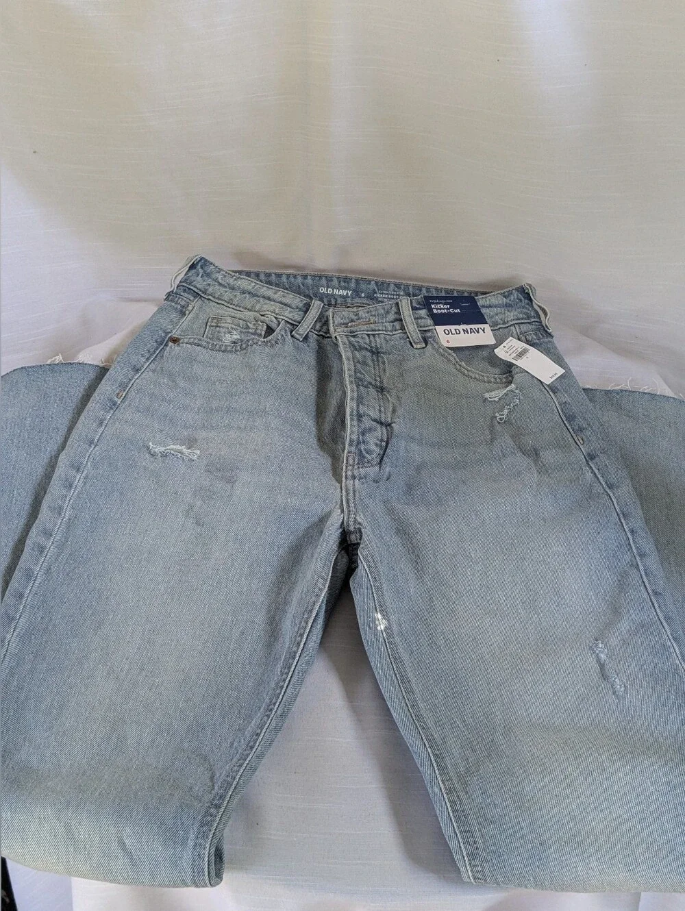 Old Navy Kicker Boot-Cut jeans featuring a light wash and distressed Sz 6